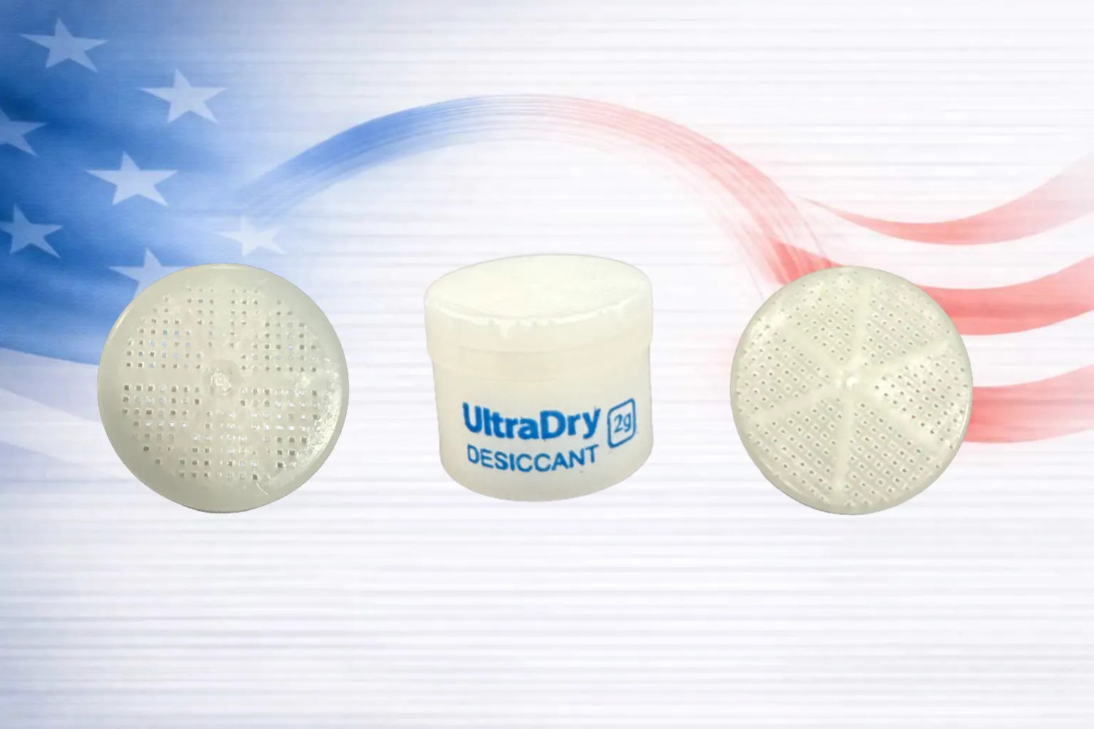 A small white plastic jar labeled 'UltraDry DESICCANT 2 grams' with a top and bottom view of the jar showing perforations to allow the jar to breath set against a stylized American flag background.