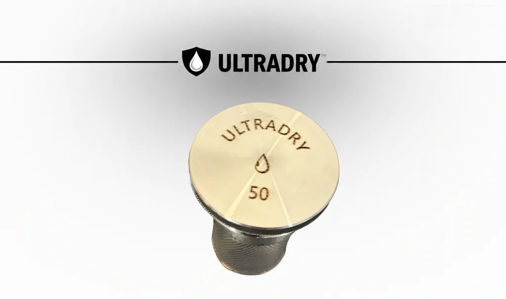 An ULTRADRY 50g desiccant port, an engrave stainless steel lid attached to a tube that can hold 50g of desiccant that is breathable in a sealed container.