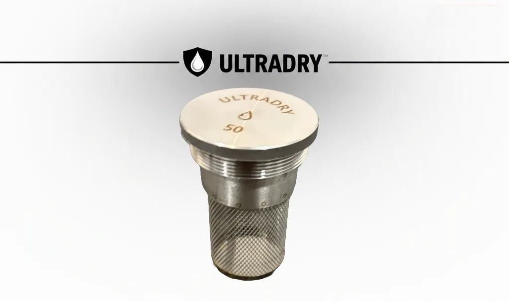 An empty superior ULTRADRY 50 gram container featuring a silver stainless steel mesh body and lid engraved with the ULTRADRY logo and '50' in brown, set against a white background with a ULTRADRY brand banner at the top.