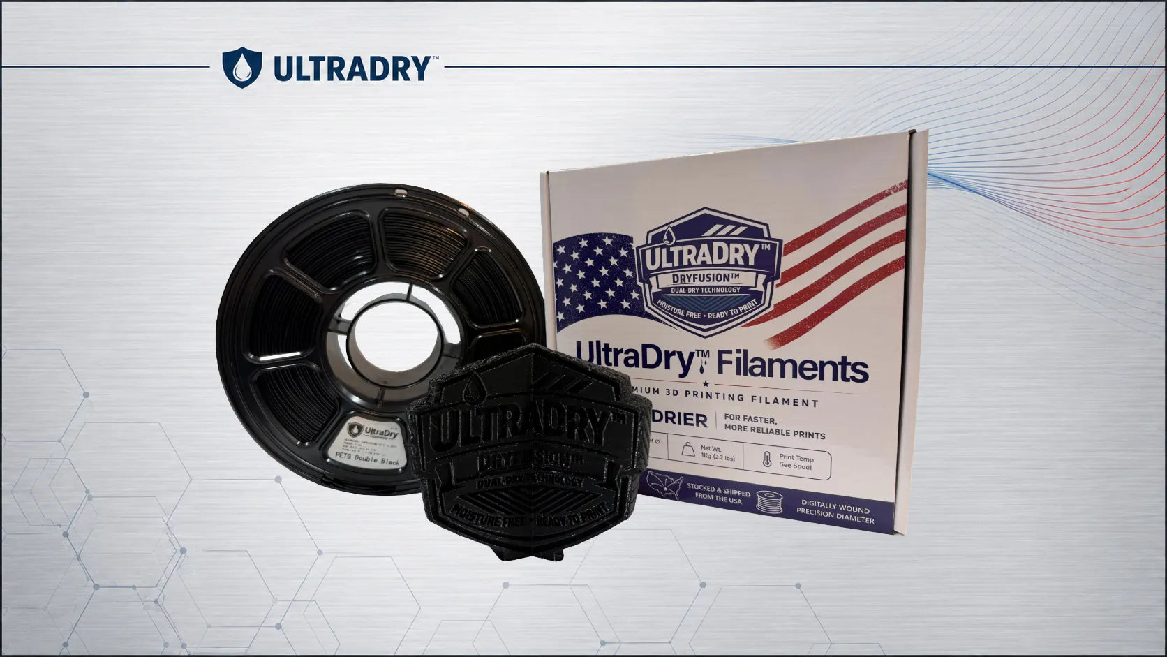 ULTRADRY UltraDry Filaments double black petg filament spool with its retail box on a light gray patterned background.