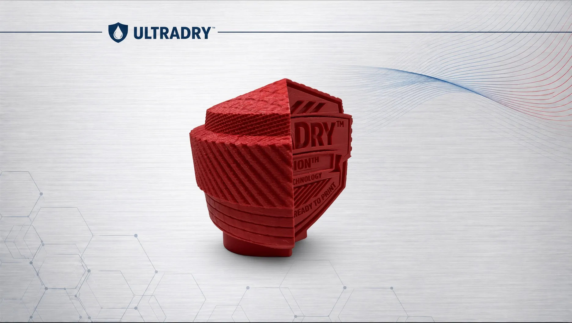 Red textured UltraDry emblem block 3D printed in Matte Firefighting Red PETG