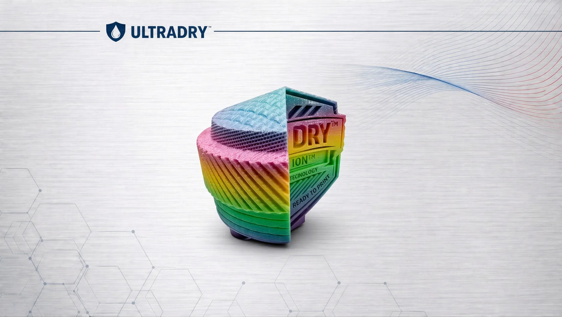 A 3D printed cylindrical product with a rainbow gradient and the word 'ULTRADRY' on the side, shown on a light gray background with the ULTRADRY logo at the top left.